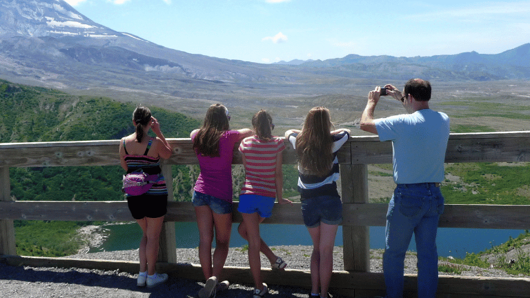 Visitors enjoy the view of Mount St Helens at Windy Ridge
